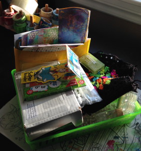 seuss cards, star purses, cabochons, 50 year old pearls, glass beads, pretty backgrounds… even a canvas and ALL of the paper plans and ideas. ALL IN THERE.